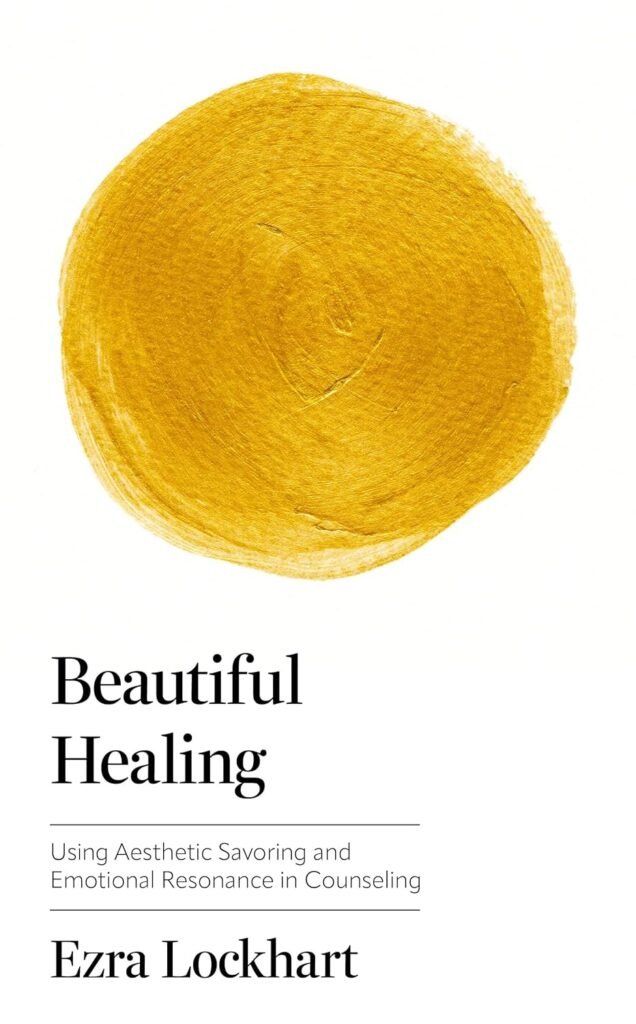 Book cover for Beautiful Healing: Using Aesthetic Savoring and Emotional Resonance in Counseling by Ezra Lockhart. A large, textured golden-yellow brushstroke circle sits above the title on a plain white background.